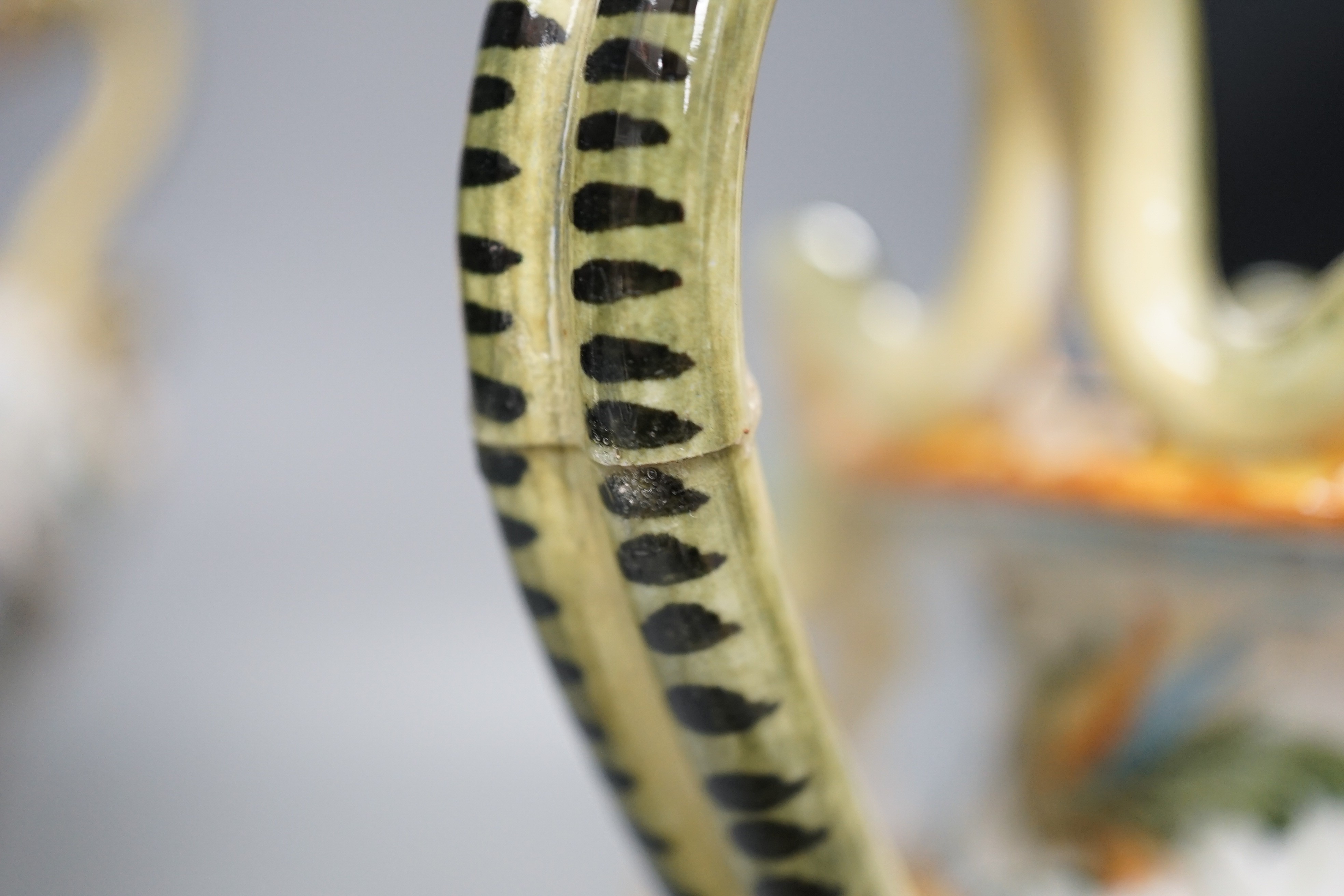 Two early 20th century Cantagalli maiolica two handled vases, tallest 23cm